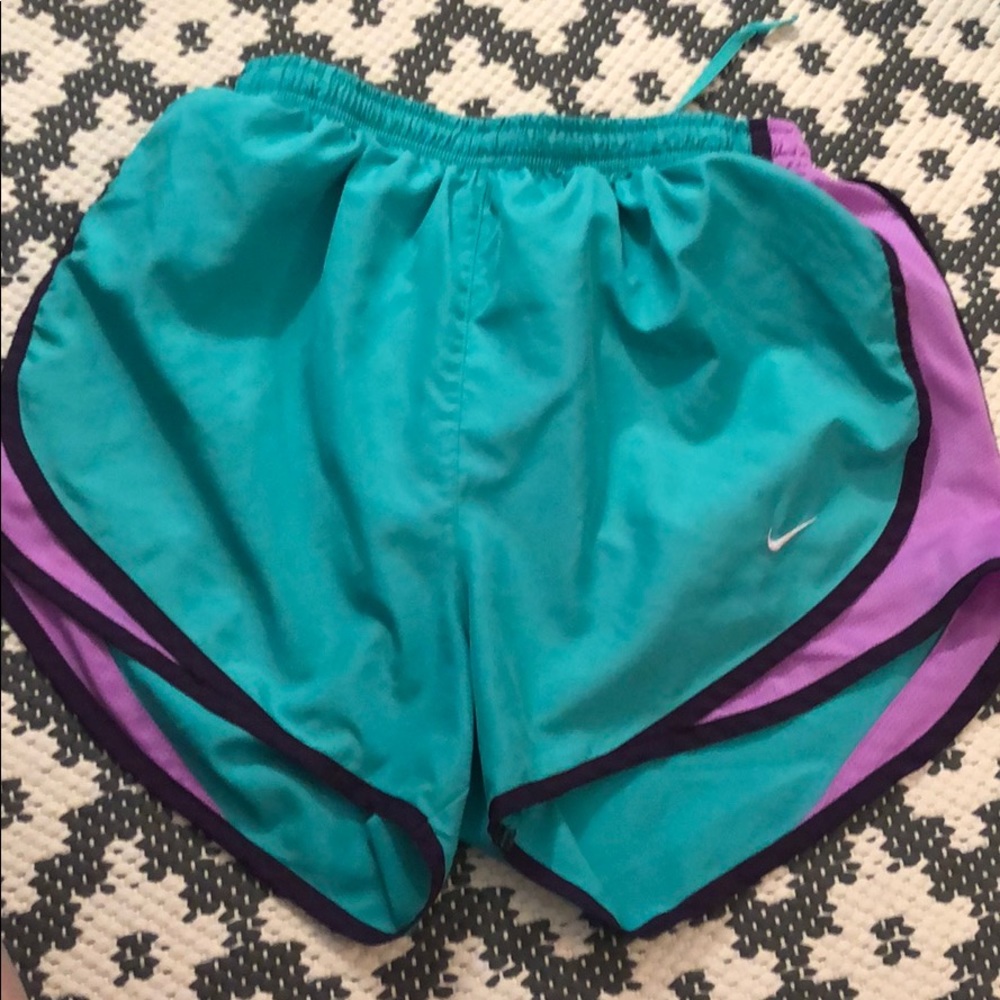 Green and purple Nike shorts